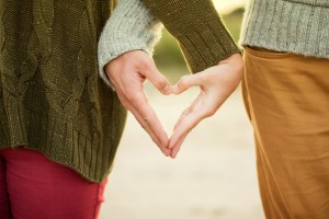 holding hands into heart